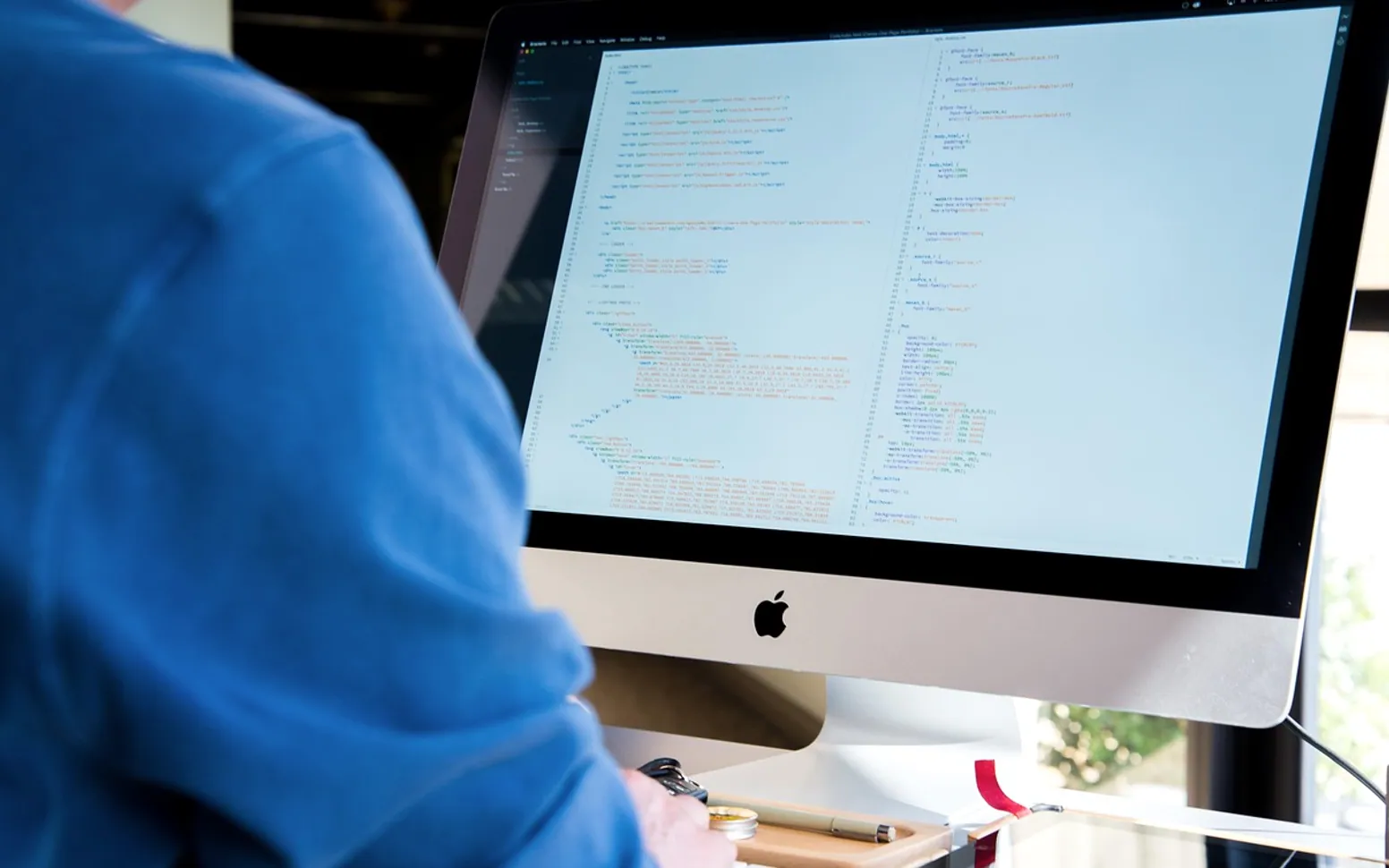 Man, computer and screen